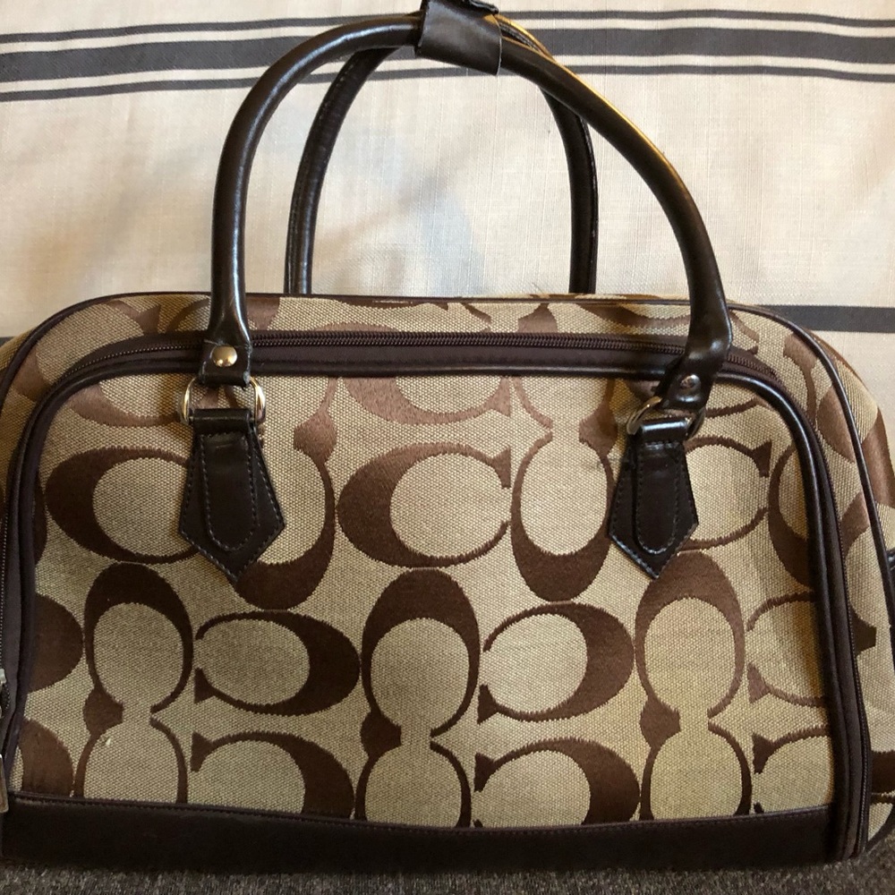 Duffel bag with wheels.
